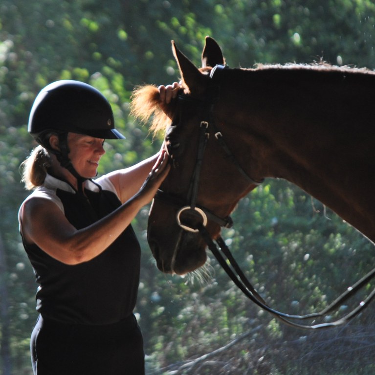 Woman with her Morgan horse