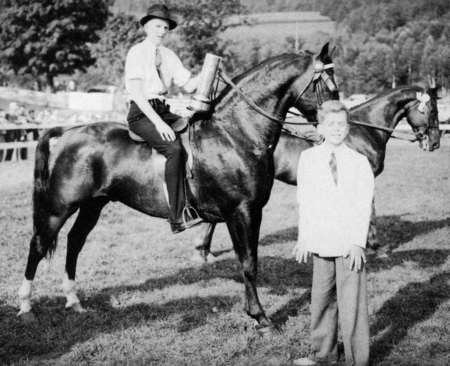 Lyman Orcutt & Ulysses &#34;Lyman Orcutt showed Ulysses to Grand Champion Stallion honors and three blue ribbons at the 1939 Morgan Show. Carlos Allen (standing), the great-great-great-great grandson of Justin Morgan, was invited to present awards.&#34;